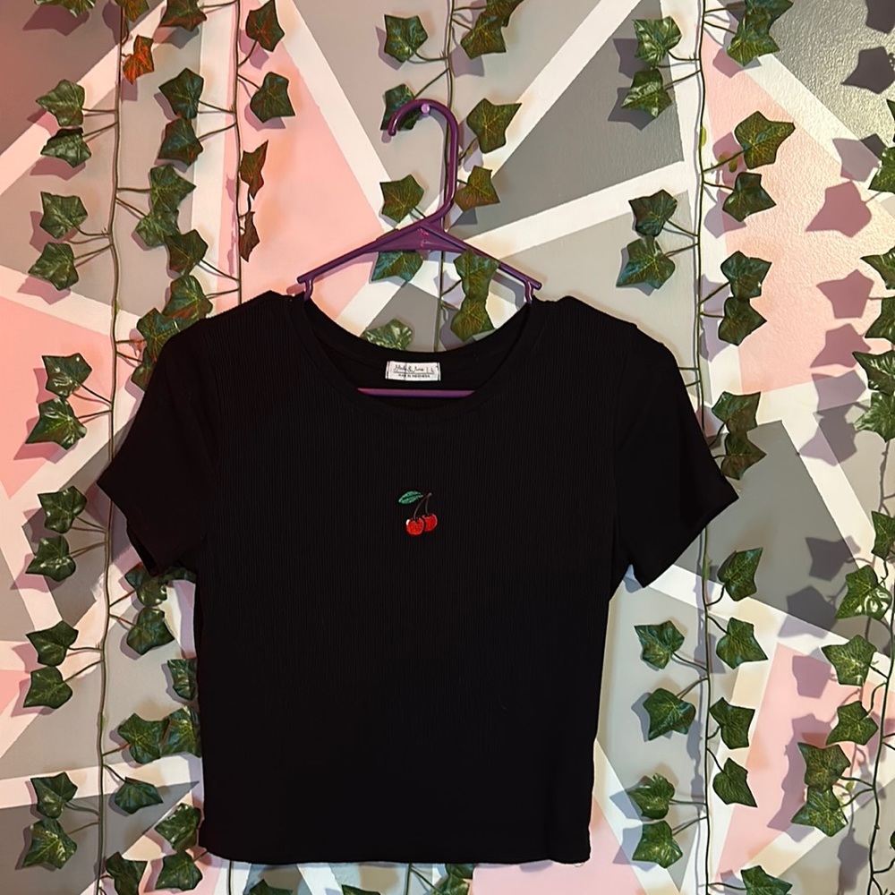 A black cherry short sleeve shirt (sorta crop top length)